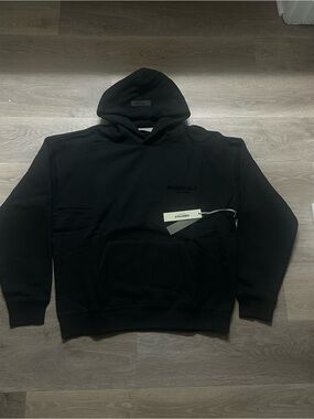 Essentials Black Pullover Hoodie with Chest Logo